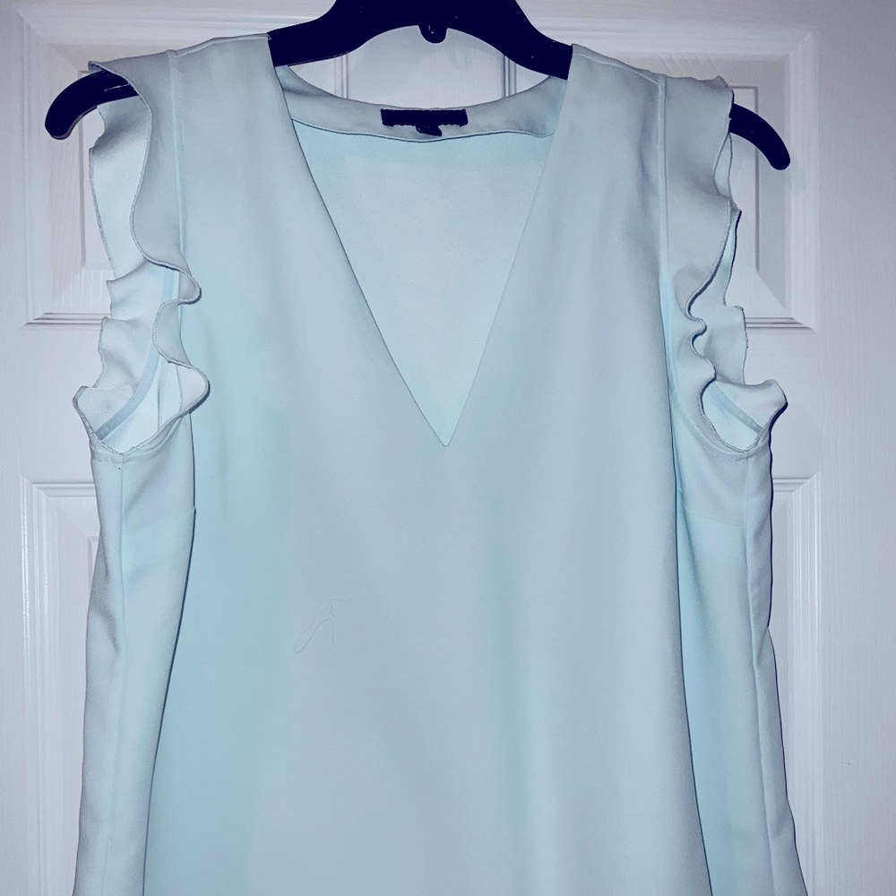 Banana Republic sleeveless blouse with peplum bottom and ruffle sleeves